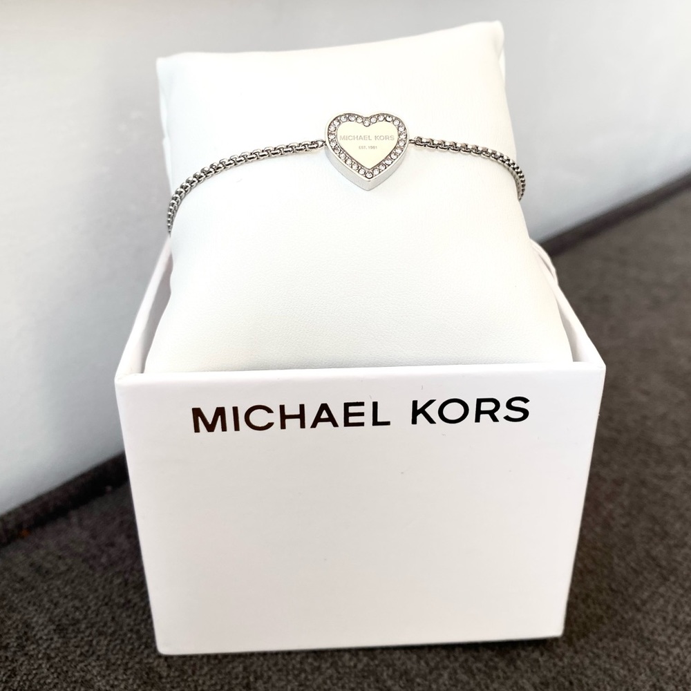 Authentic Michael Kors silver tone heart adjustable bracelet